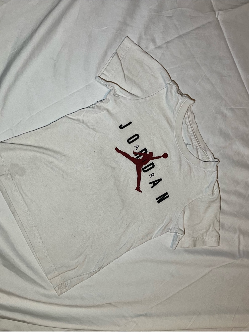 Jordan Men’s White Short Sleeve Tee with Red Jumpman Graphic
